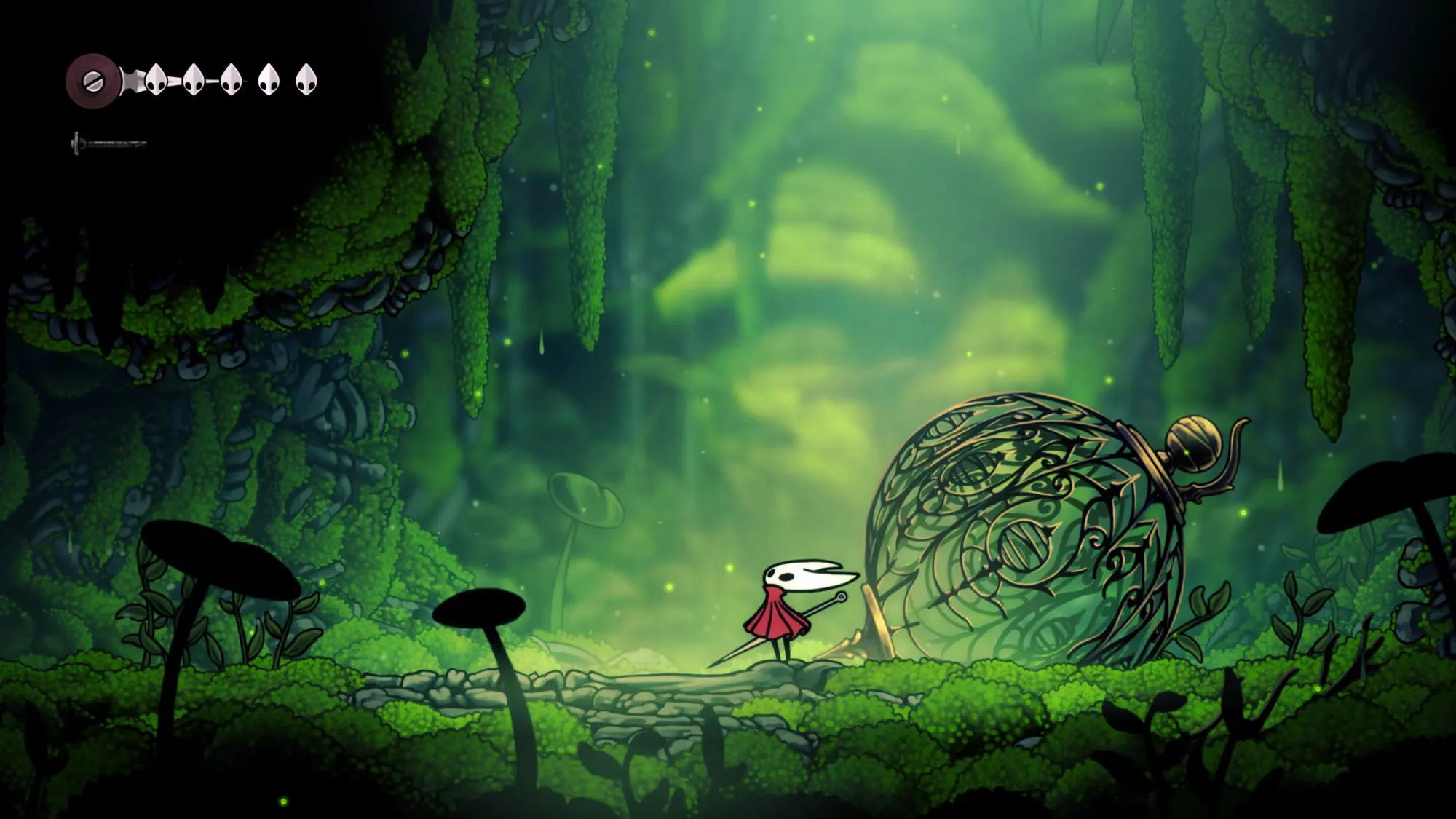 A still from the game Hollow Knight Silksong. A small white figure with long ears and wearing a red cape stood in a forest holding a needle.